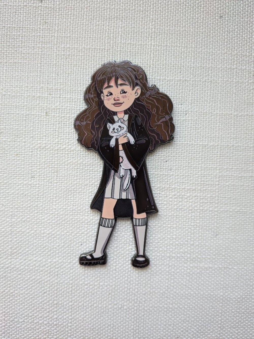 Hermione Granger with ferret plushie pin